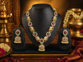 Traditional necklace and earrings with multicolour stones